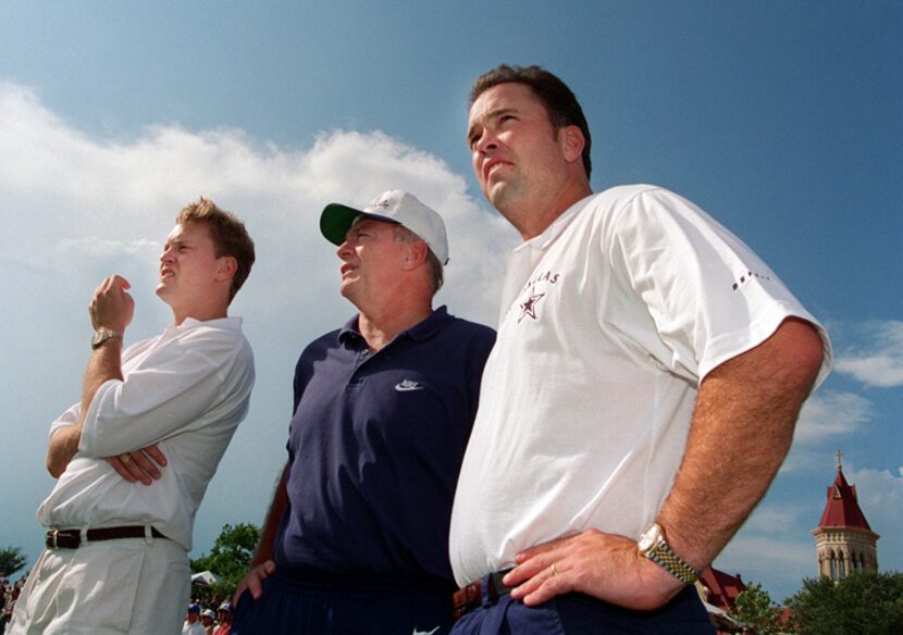  Left to right, Jerry Jones Jr., Jerry Jones, and Stephen Jones watch the Dallas Cowboys...