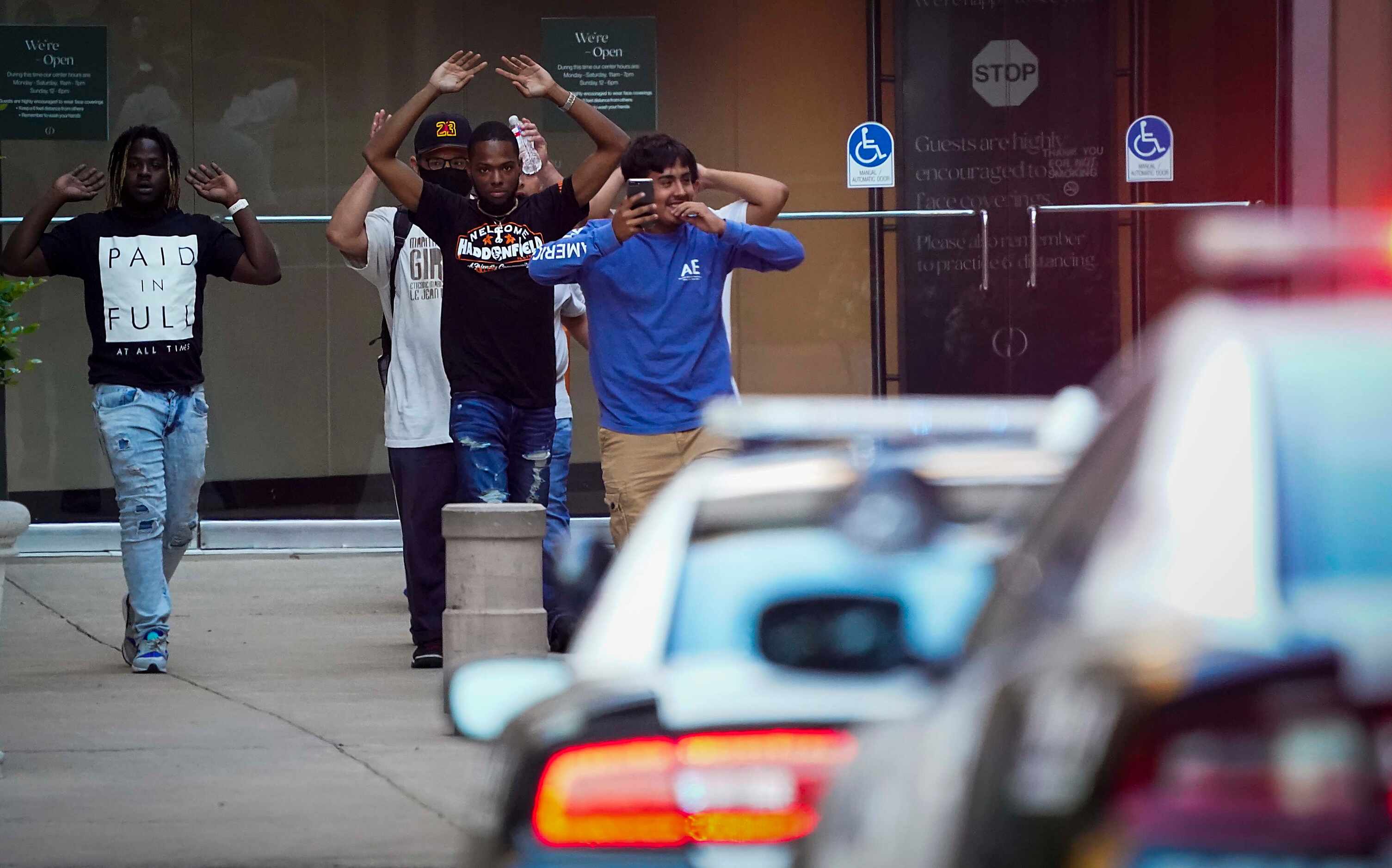 Dallas police direct people away from the Nordstrom store at the Galleria Dallas on Tuesday,...