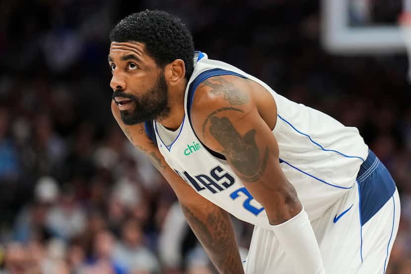 Dallas Mavericks guard Kyrie Irving (2) looks on during the second half of an NBA basketball...