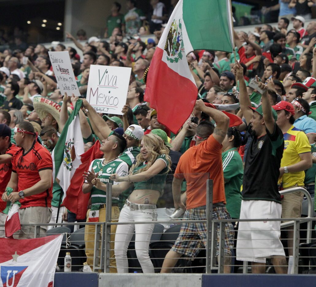 Mexico fans celebrate the team's second goal against Ecuador in the second half of...