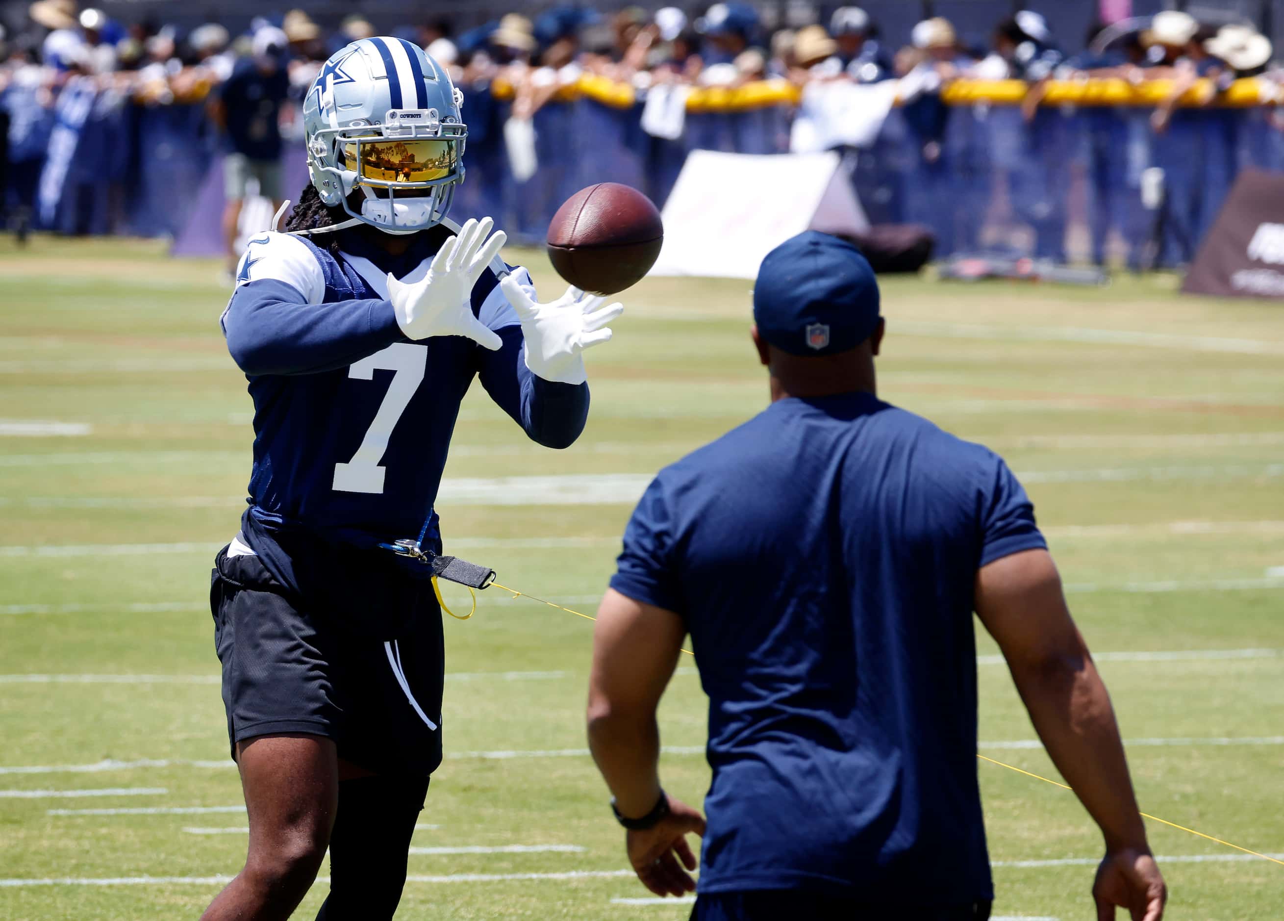 Dallas Cowboys cornerback Trevon Diggs (7) works out on a side field as he still recovering...