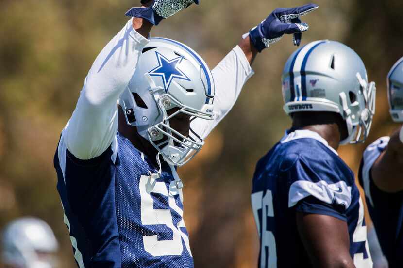 Dallas Cowboys defensive end Robert Quinn (58) dances during an afternoon practice at...