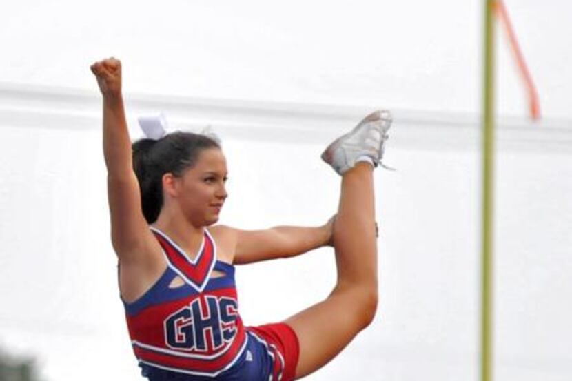 
Grapevine High School cheerleader Kate Biebighauser performed at a football game last fall.
