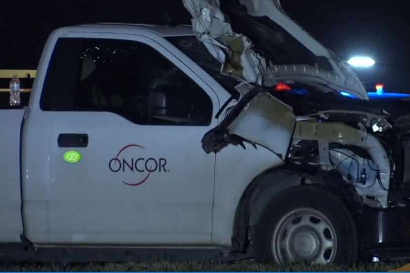 An Oncor truck was heavily damaged after a wreck in which a pedestrian was killed Wednesday...