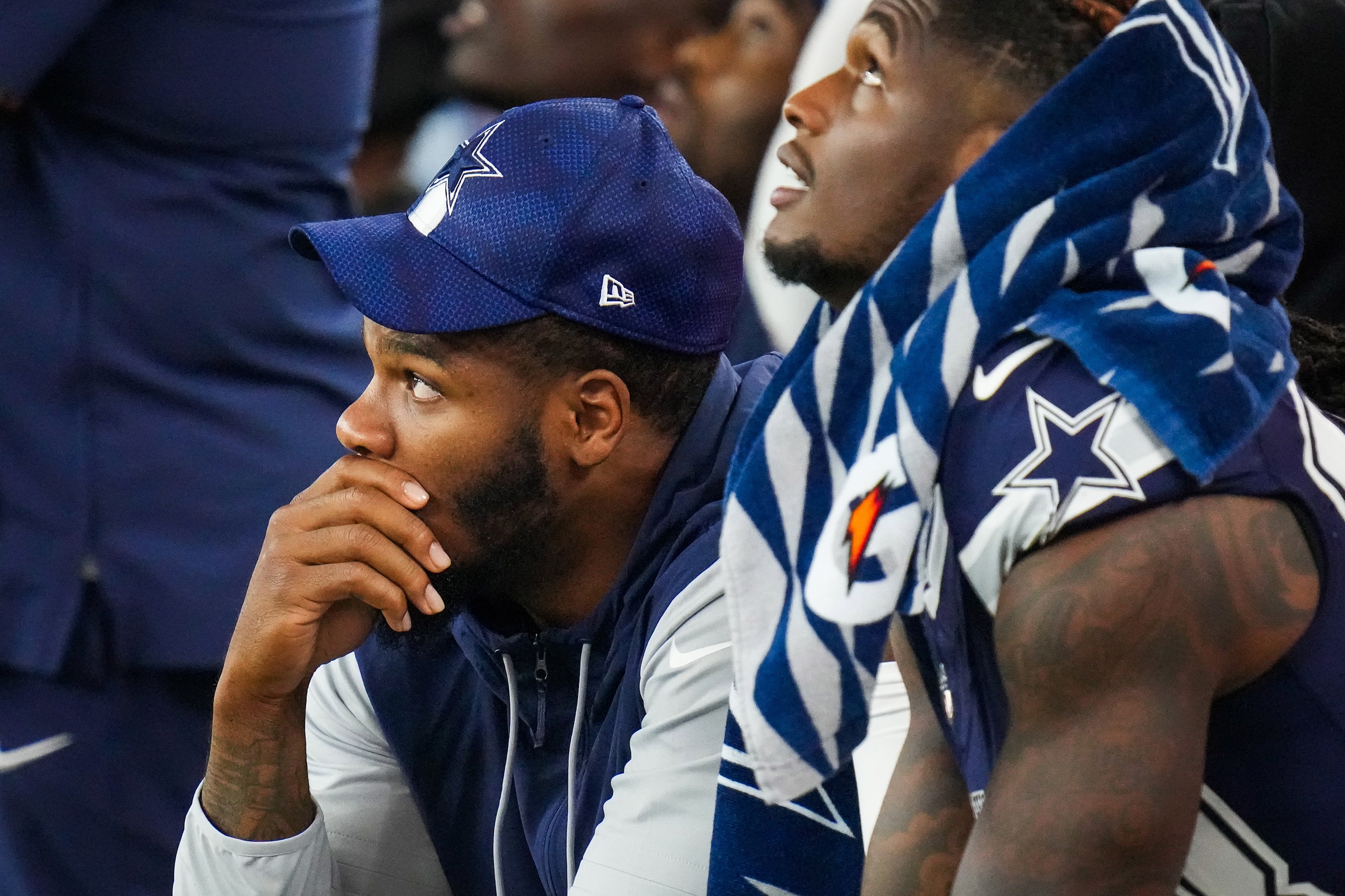 Dallas Cowboys linebacker Micah Parsons (left) and wide receiver CeeDee Lamb watch from the...