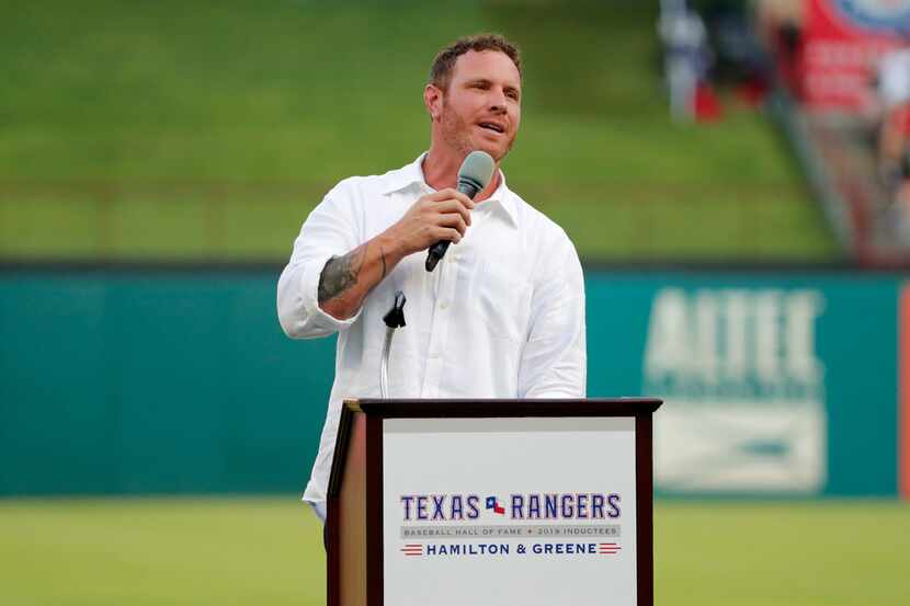 Former Texas Rangers player Josh Hamilton makes comments during a ceremony where the club...