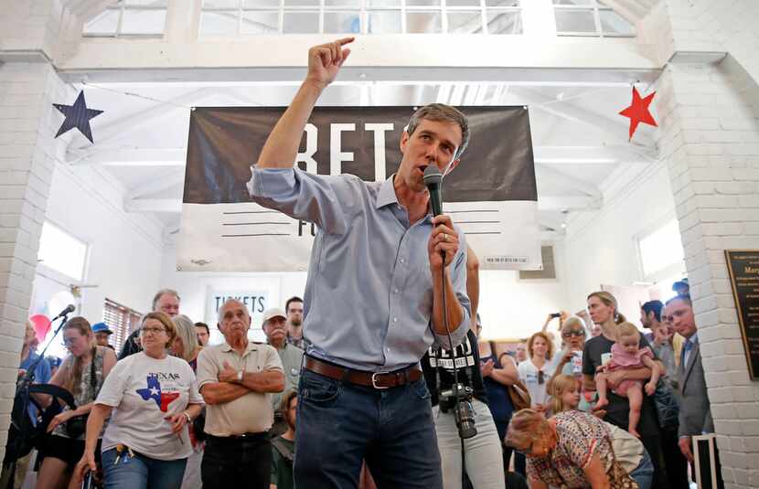 Congressman Beto O'Rourke speaks to supporters during a town hall at the Historic Santa Fe...