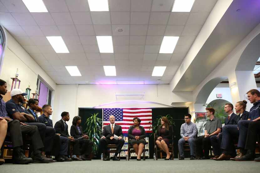 Attorney General Loretta Lynch (center) speaks during a student roundtable on community...