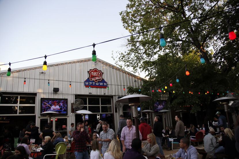 People enjoy nice patio atmosphere Friday early evening at Katy Trail Ice House in Dallas,...