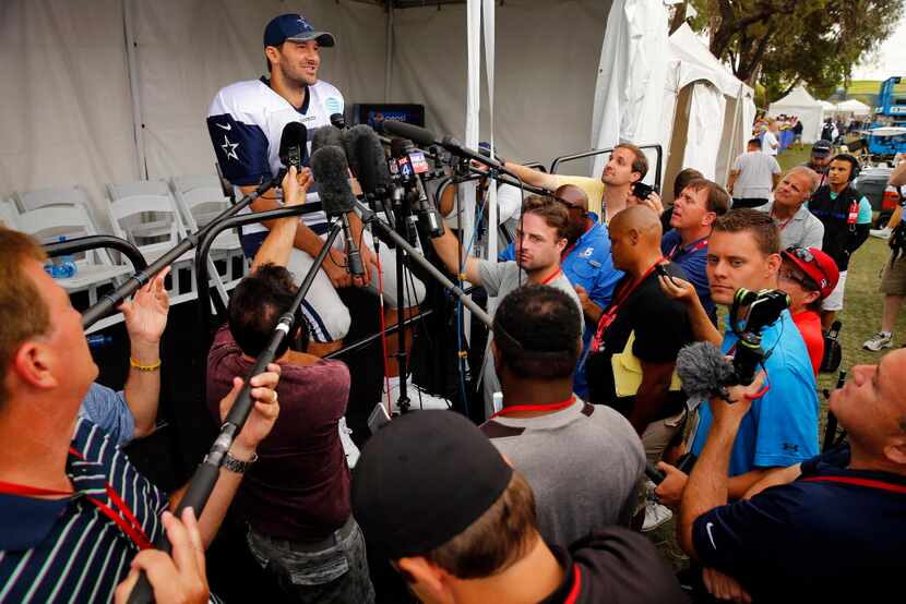 Dallas Cowboys quarterback Tony Romo (9) responds to questions during his first interview at...