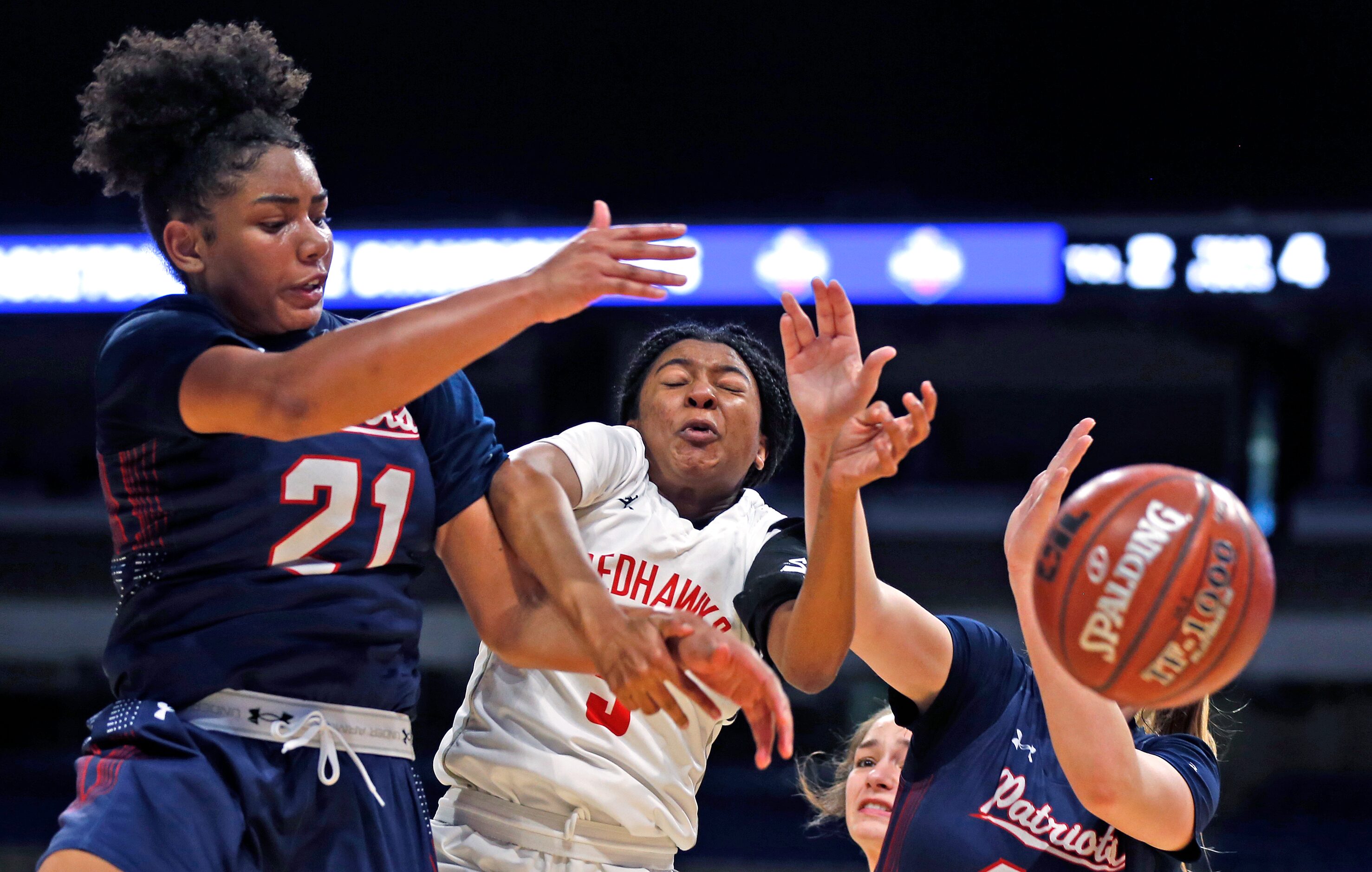 Frisco Liberty guard Zoe Junior #5 fights for a rebound against Fairfield forward McKinna...