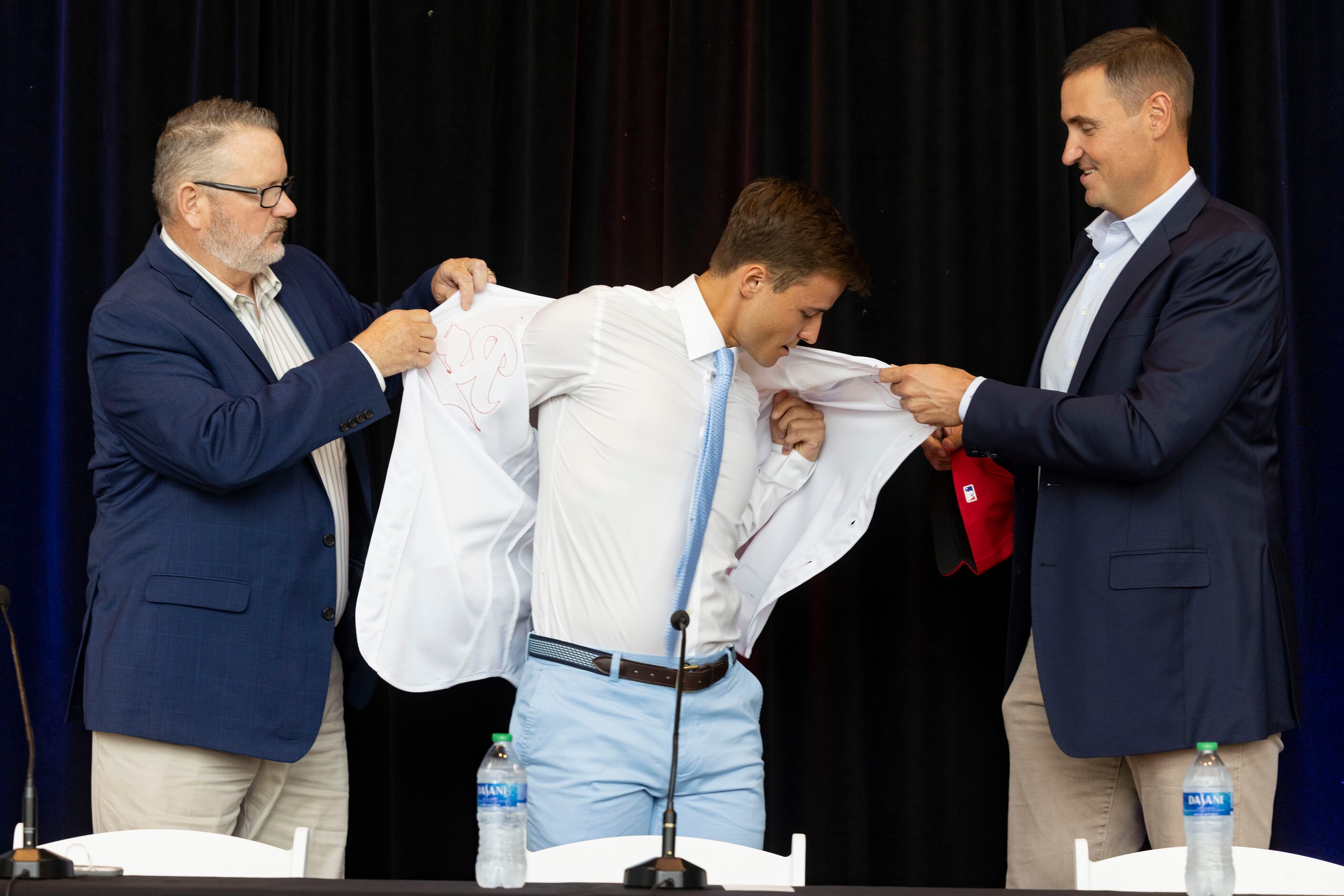 Kip Fagg (left), Texas Rangers Senior Director of Amateur Scouting, Chris Young (right),...