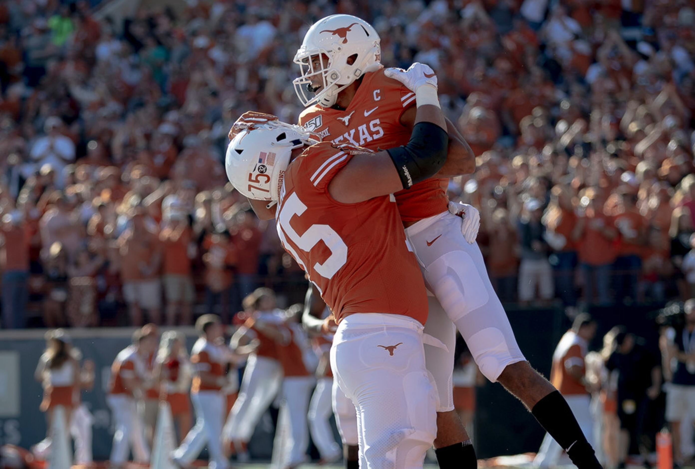 Texas wide receiver Collin Johnson (9) celebrates a touchdown against Kansas State reception...