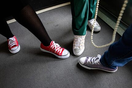 From left: Principal Rockell Stewart, Ellyn Favors and Vonda Pipkin wore Chucks and pearls...