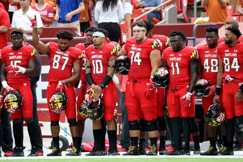 LANDOVER, MD - SEPTEMBER 1: Members of the Maryland Terrapins observe a moment of silence in...