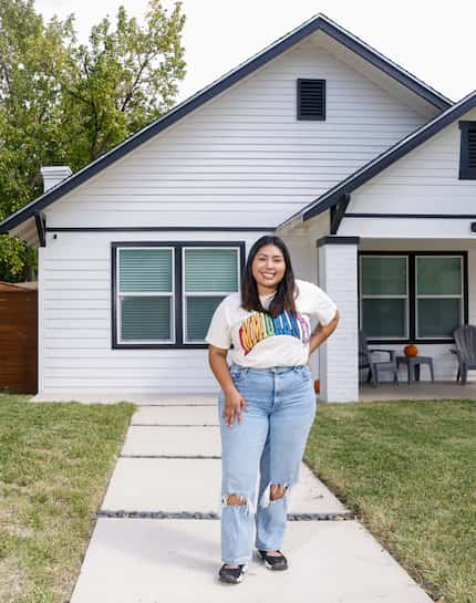 Carolina Falcón outside her Oak Cliff home.