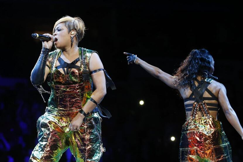 T-Boz (left) and Chilli (right) of TLC during a performance at American Airlines Center in...