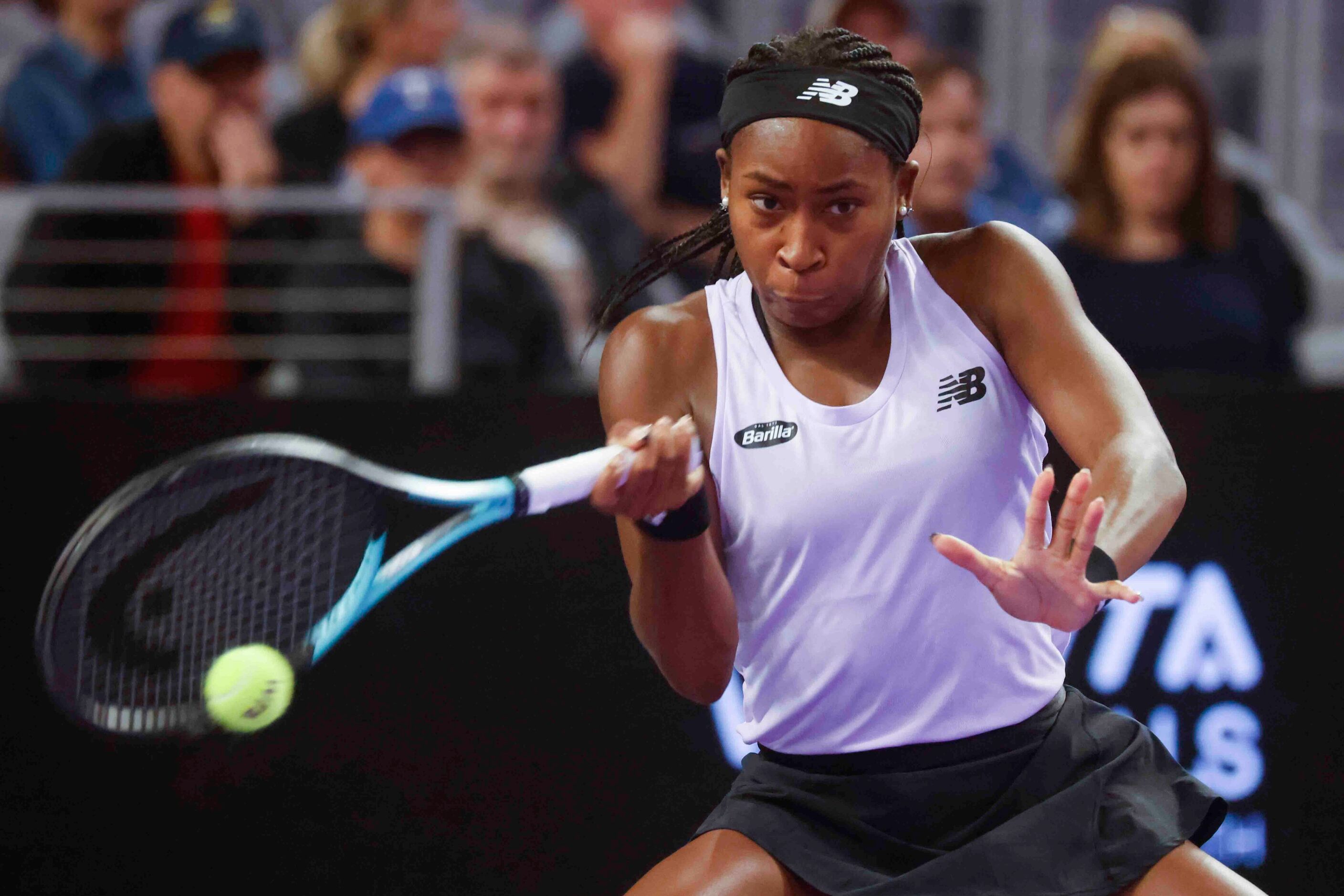 Coco Gauff of the USA returns a shot against Caroline Garcia of France on day two of the WTA...