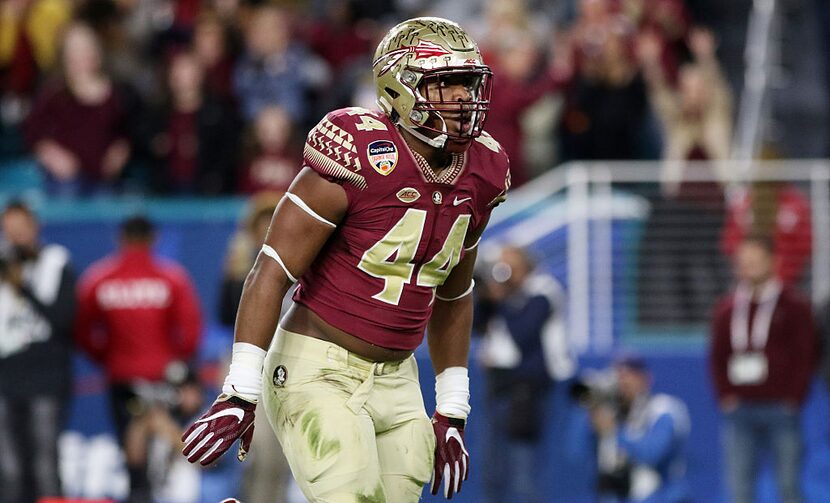 MIAMI GARDENS, FL - DECEMBER 30:  DeMarcus Walker #44 of the Florida State Seminoles reacts...