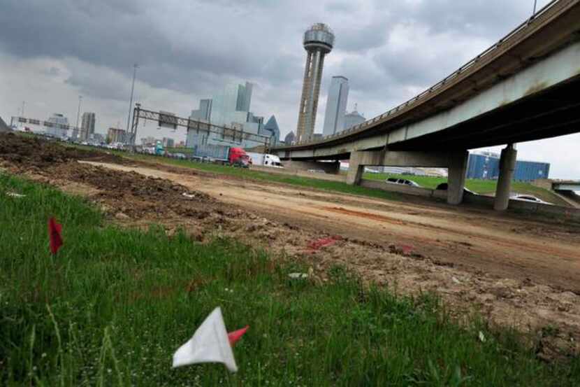 
Roadwork continues near the intersection of I-30 and I-35E near downtown Dallas in the area...