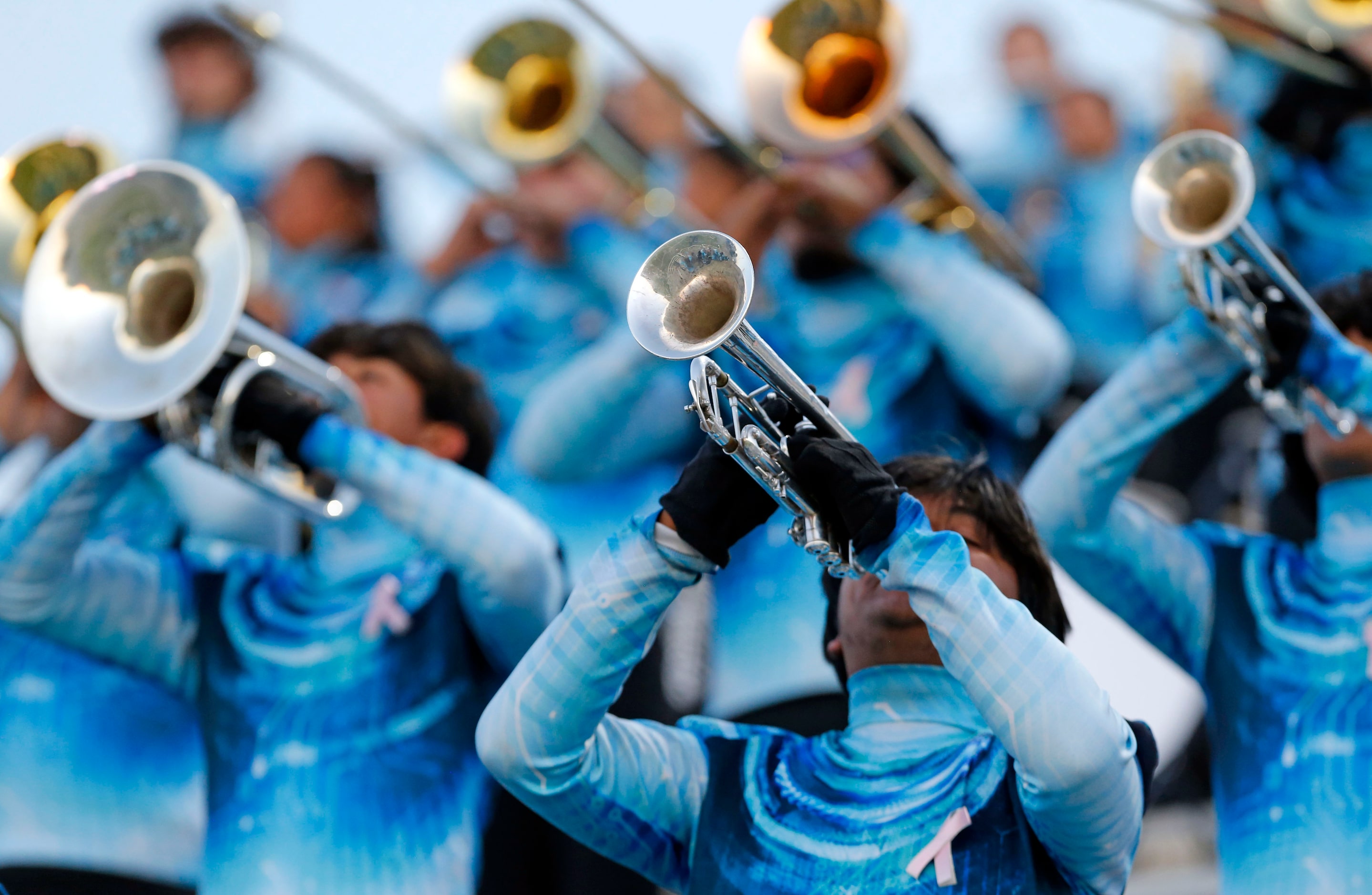 The Carrollton Newman Smith High band plays before the start of the first half of a high...