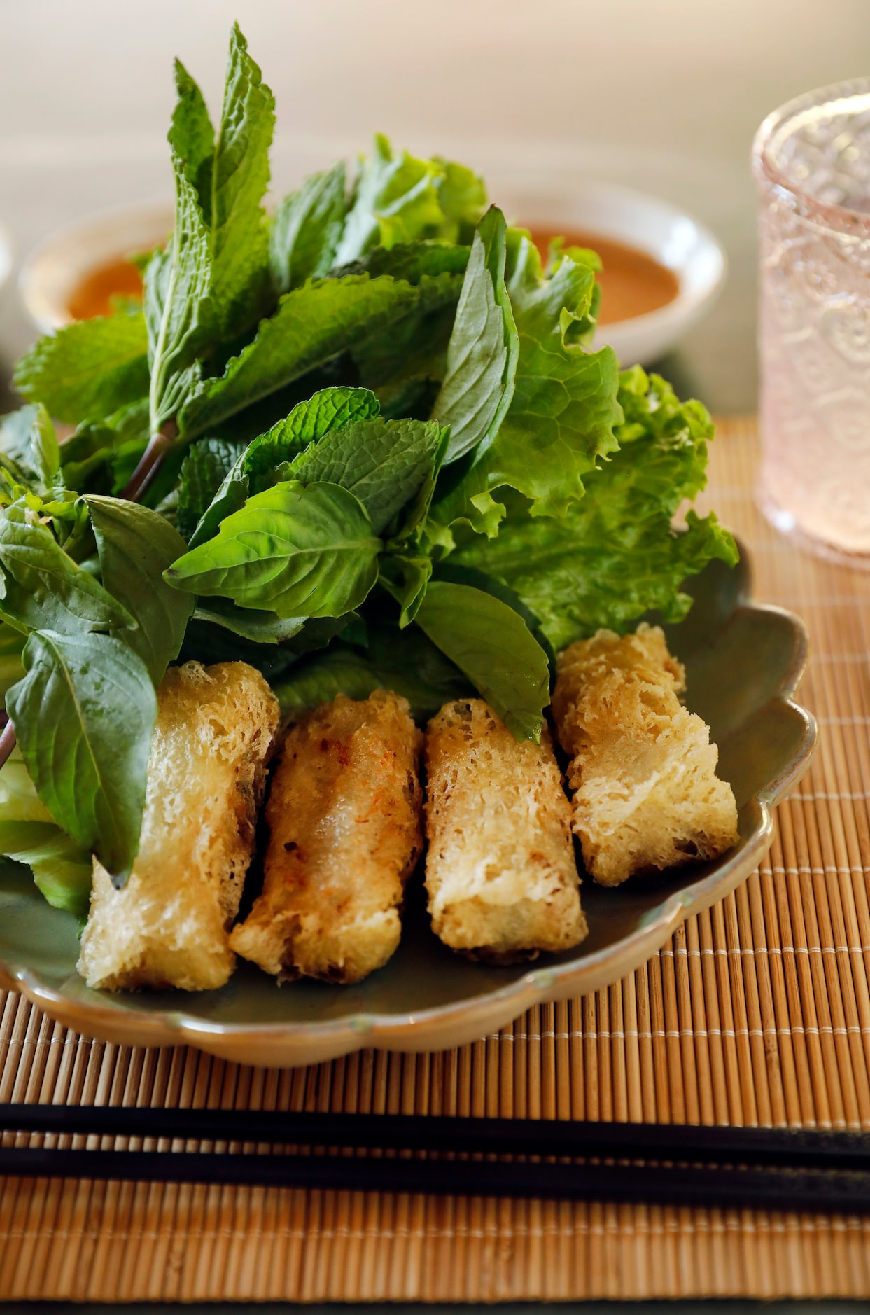 Fried spring rolls with green leaf lettuce & Thai herbs and house fish sauce is on the menu...