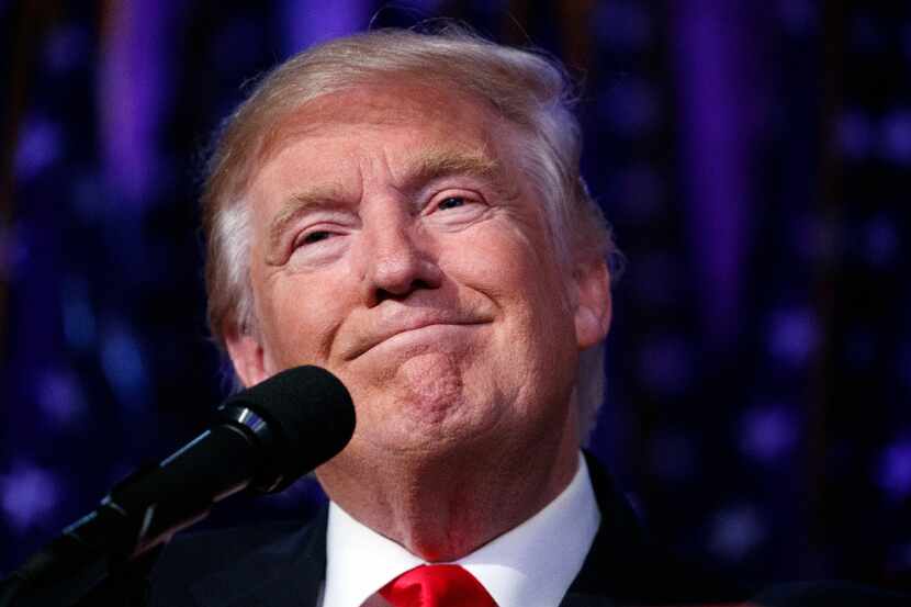 FILE - In this Wednesday, Nov. 9, 2016 file photo, President-elect Donald Trump smiles as he...