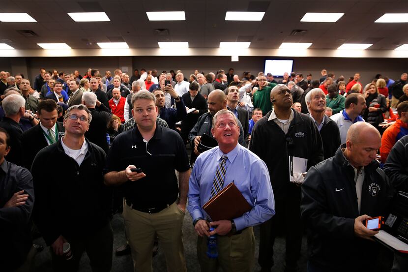 Dallas-area coaches and athletic directors gathered to view the new UIL realignment was...