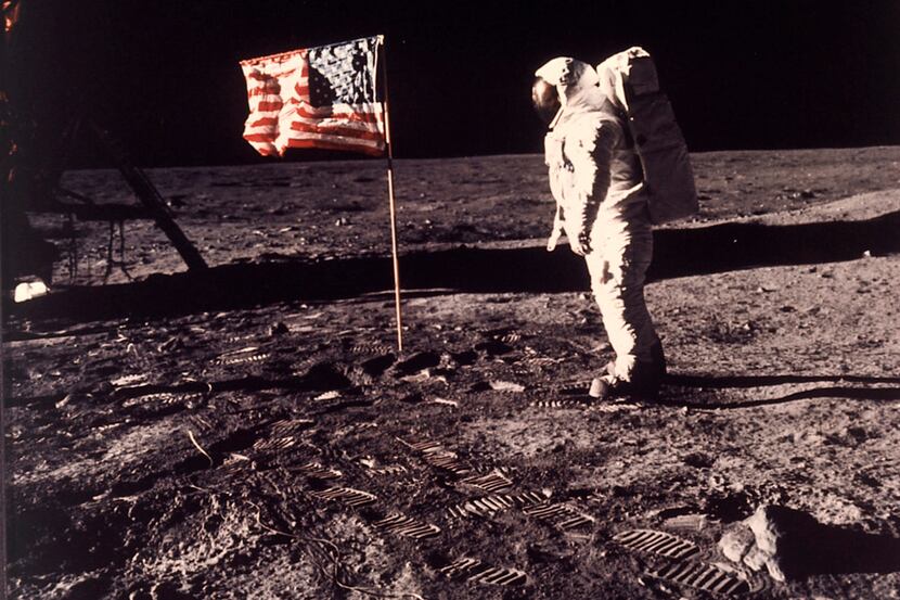 In this image provided by NASA, astronaut Buzz Aldrin poses for a photograph beside the U.S....