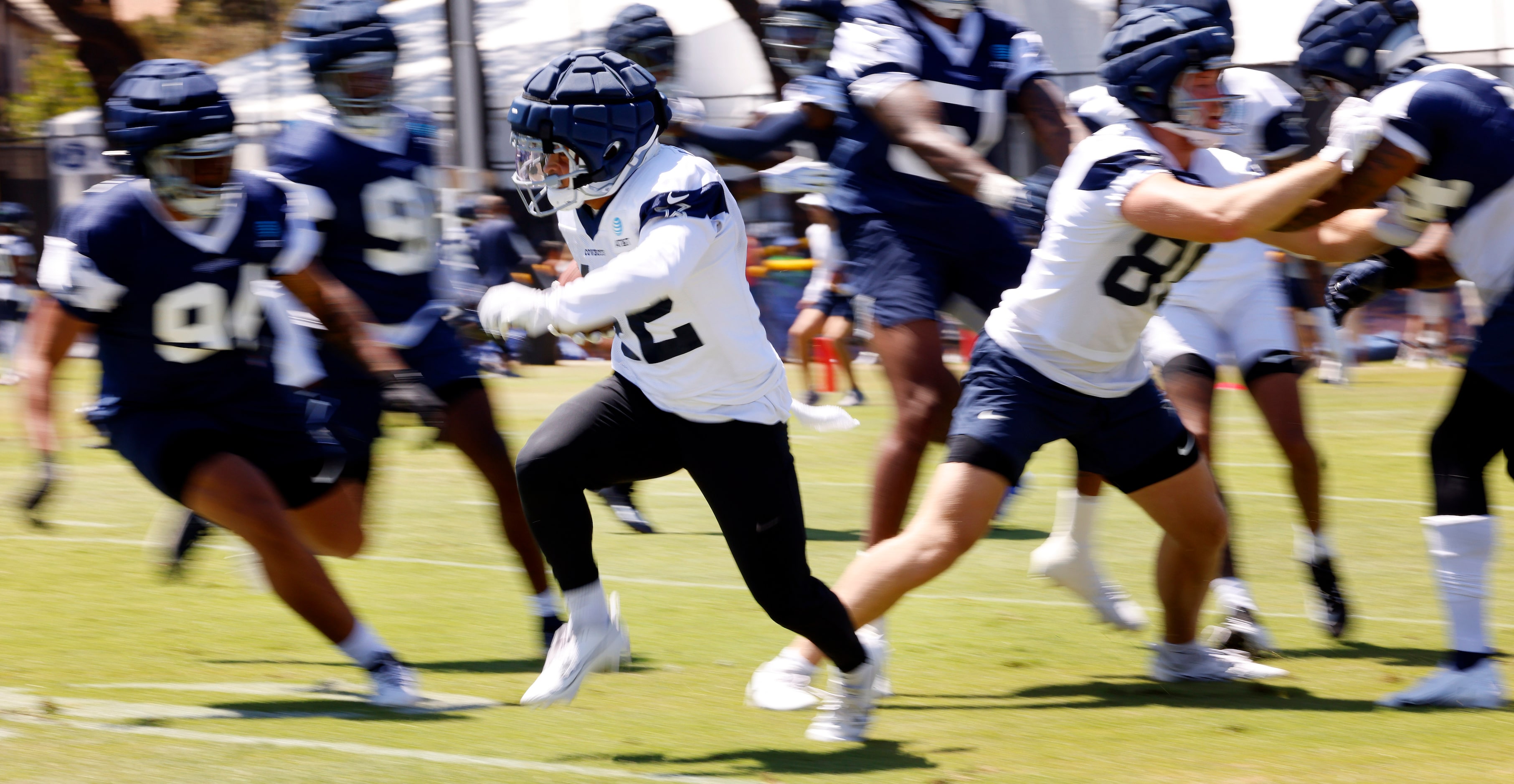 Dallas Cowboys running back Deuce Vaughn (42) returns a kick during the new special teams...