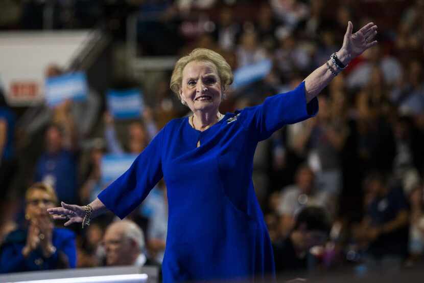 Former U.S. Secretary of State Madeleine Albright waves to the crowd before speaking during...