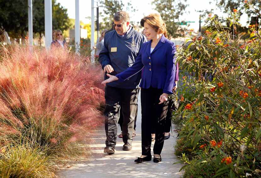 Former First Lady Laura Bush, the founder of Texan by Nature, visits Klyde Warren Park with...