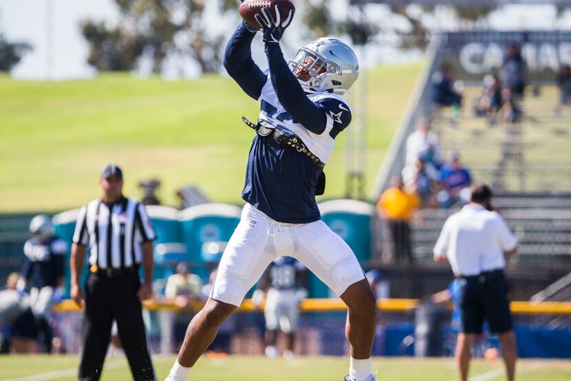Dallas Cowboys running back Tony Pollard (36) catches a pass during an afternoon practice at...