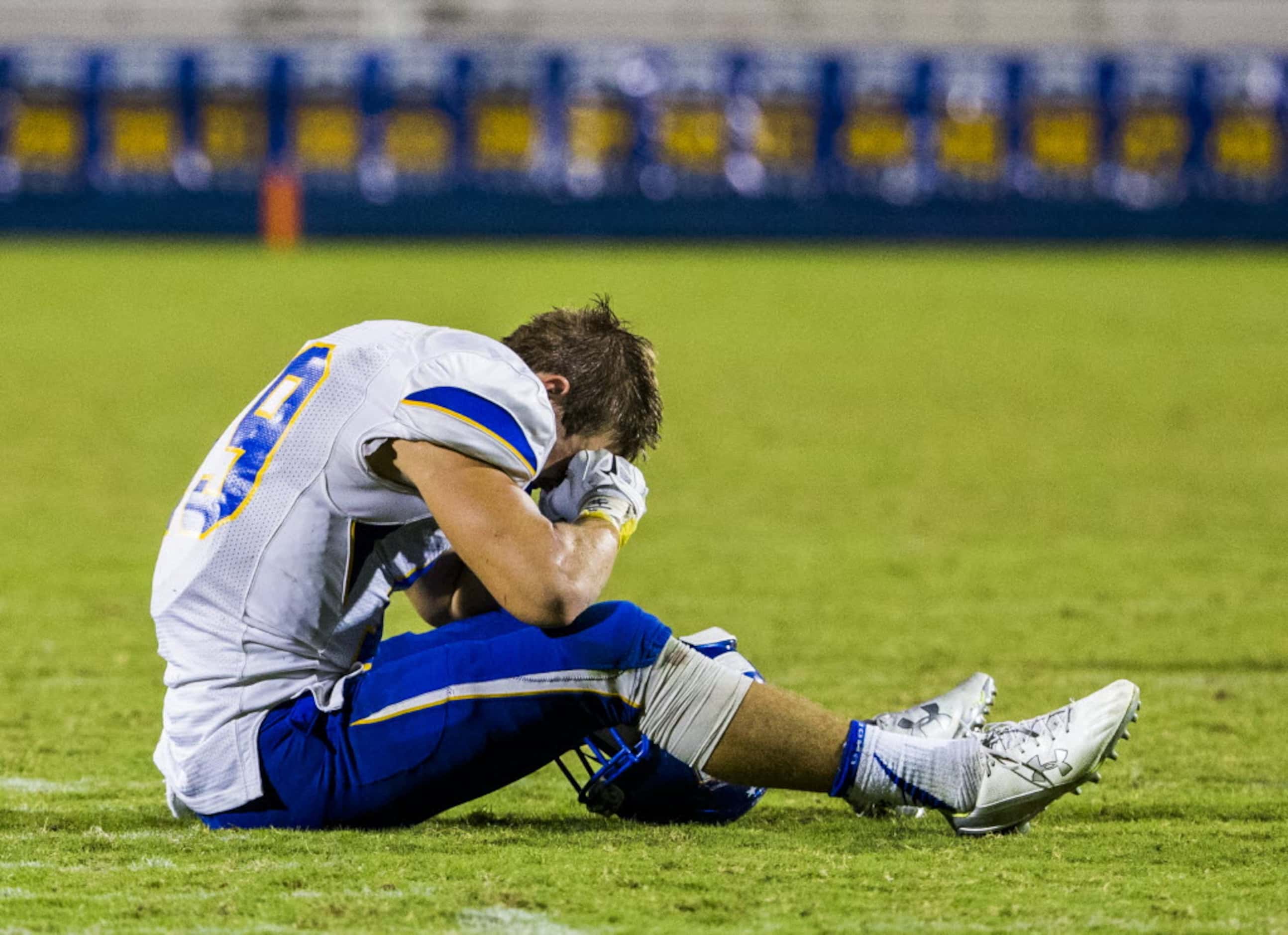 Frisco linebacker Grayson Thorburn reacts to losing 31-27 in overtime to Frisco Centennial...