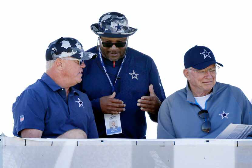 Dallas Cowboys Vice President of Player Personnel Will McClay (center) visits with owner...