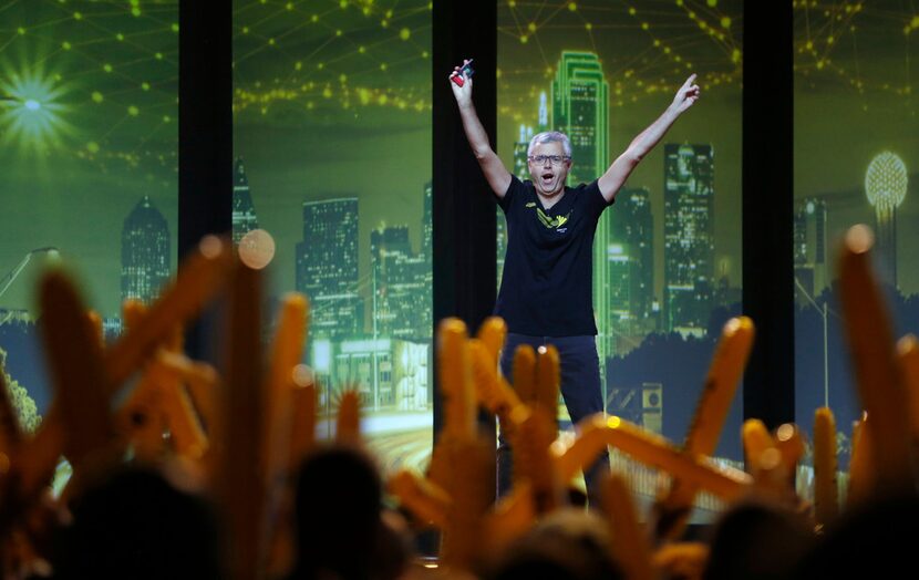 Sprint CEO Michel Combes received applause as he walks out on stage in front of employees at...