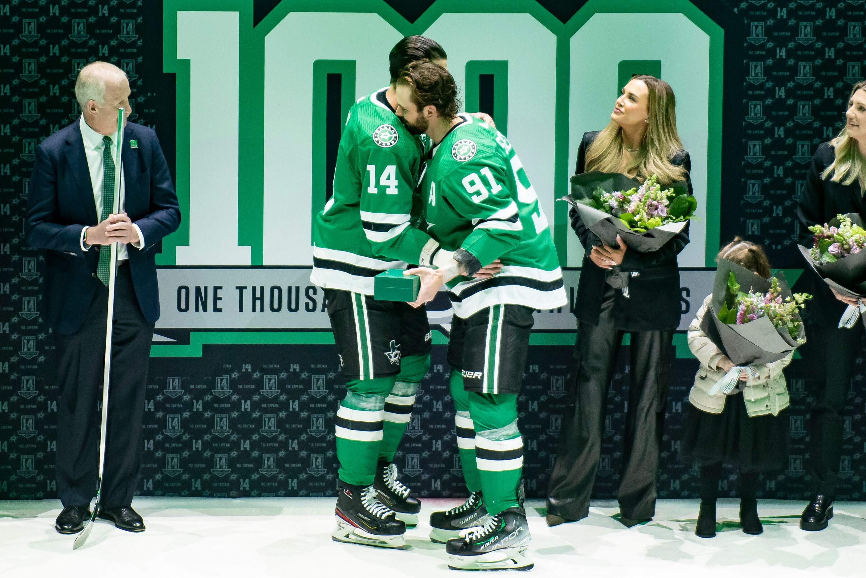 Dallas Stars left wing Jamie Benn (14) and center Tyler Seguin (91) embrace during a...