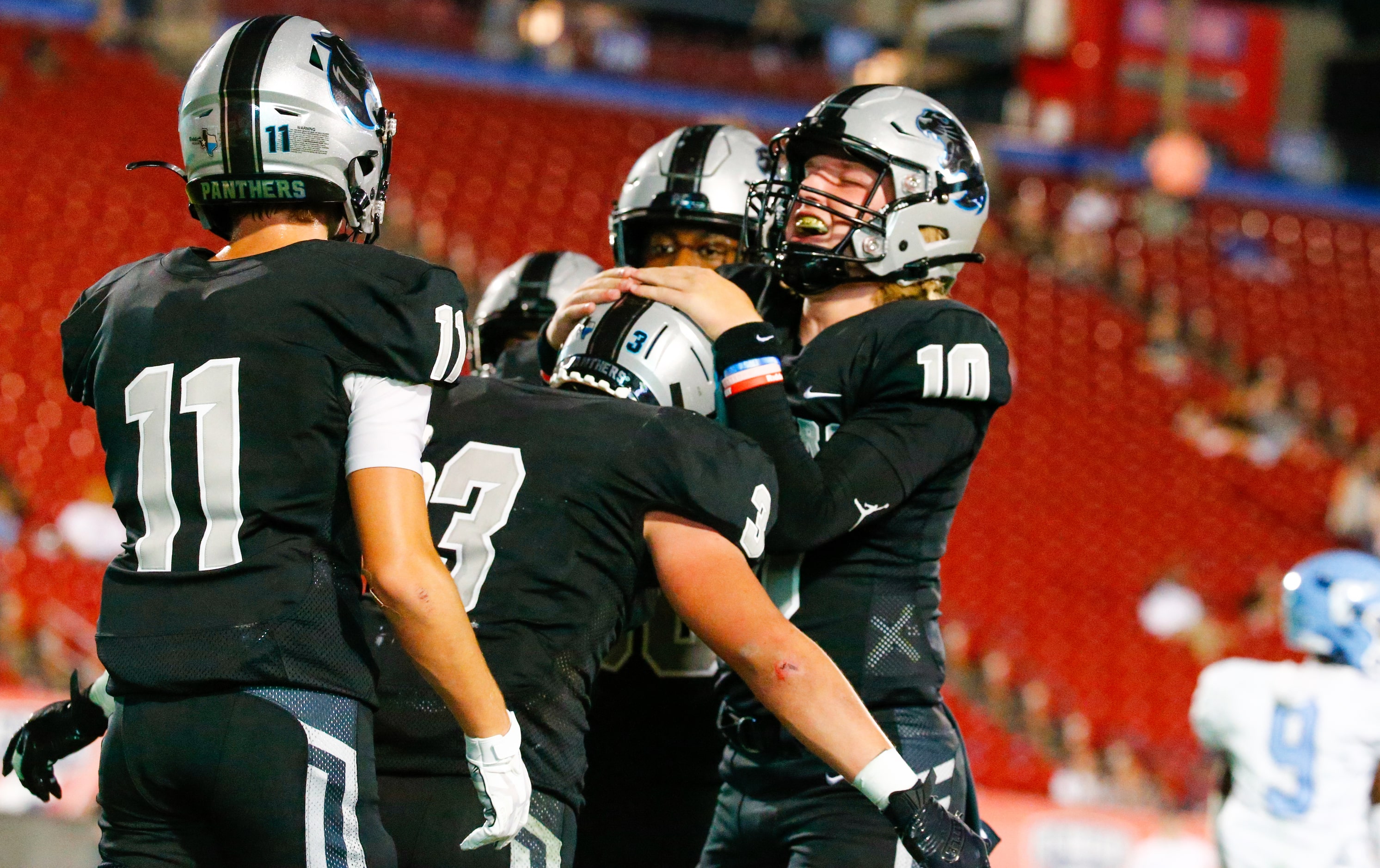 Panther Creek Panthers celebrate wide receiver Seth Jackson’s (3) touchdown during the...