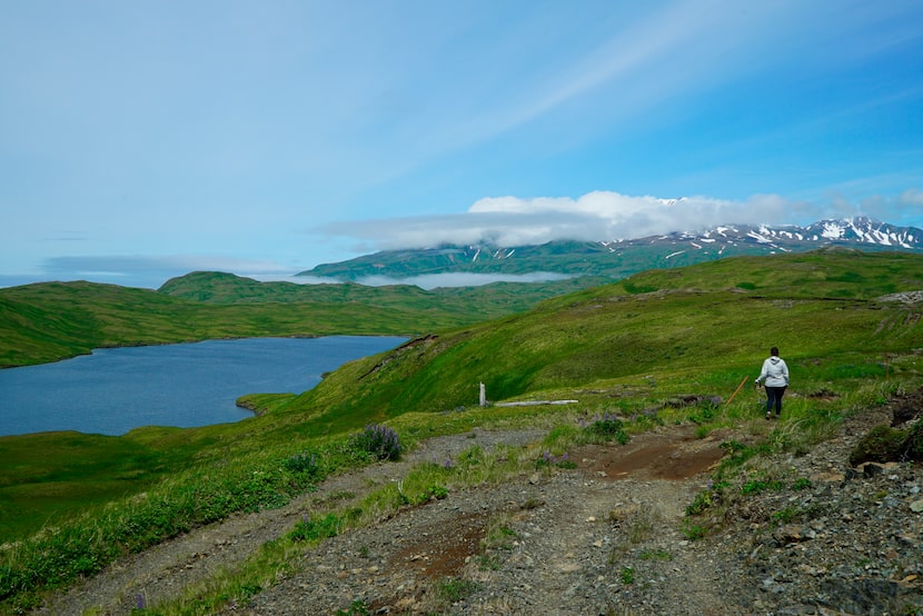 FILE - This July 8, 2021, photograph shows a hiker en route to Lake Bonnie Rose, one of many...