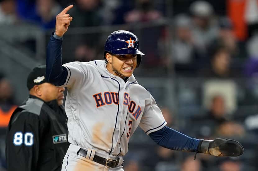 Houston Astros Jeremy Pena (3) reacts after scoring on a base hit by Alex Bregman against...