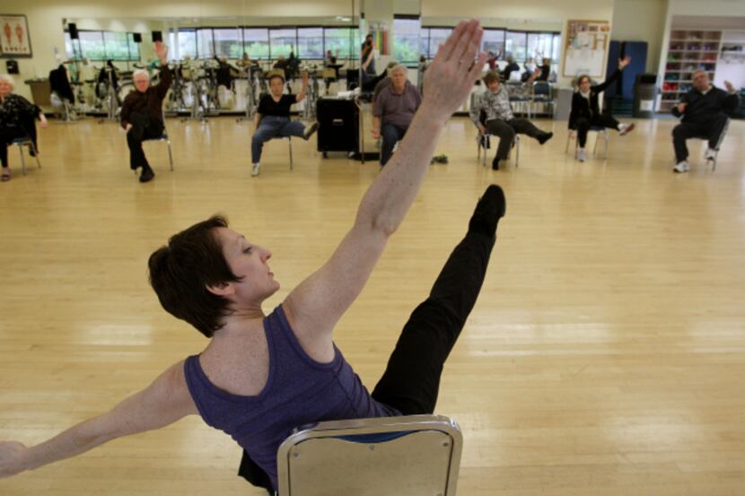 Misty Owens, instructor for the Dance for Movement Disorders Class leads the class in the...