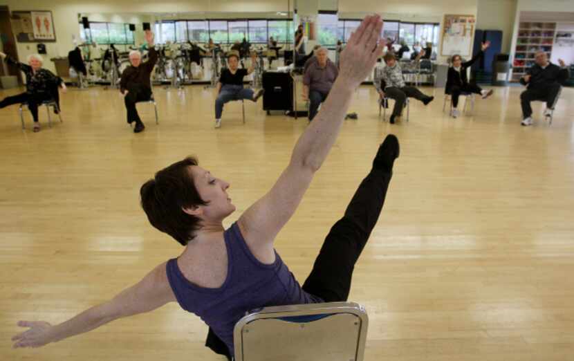 Misty Owens, instructor for the Dance for Movement Disorders Class leads the class in the...