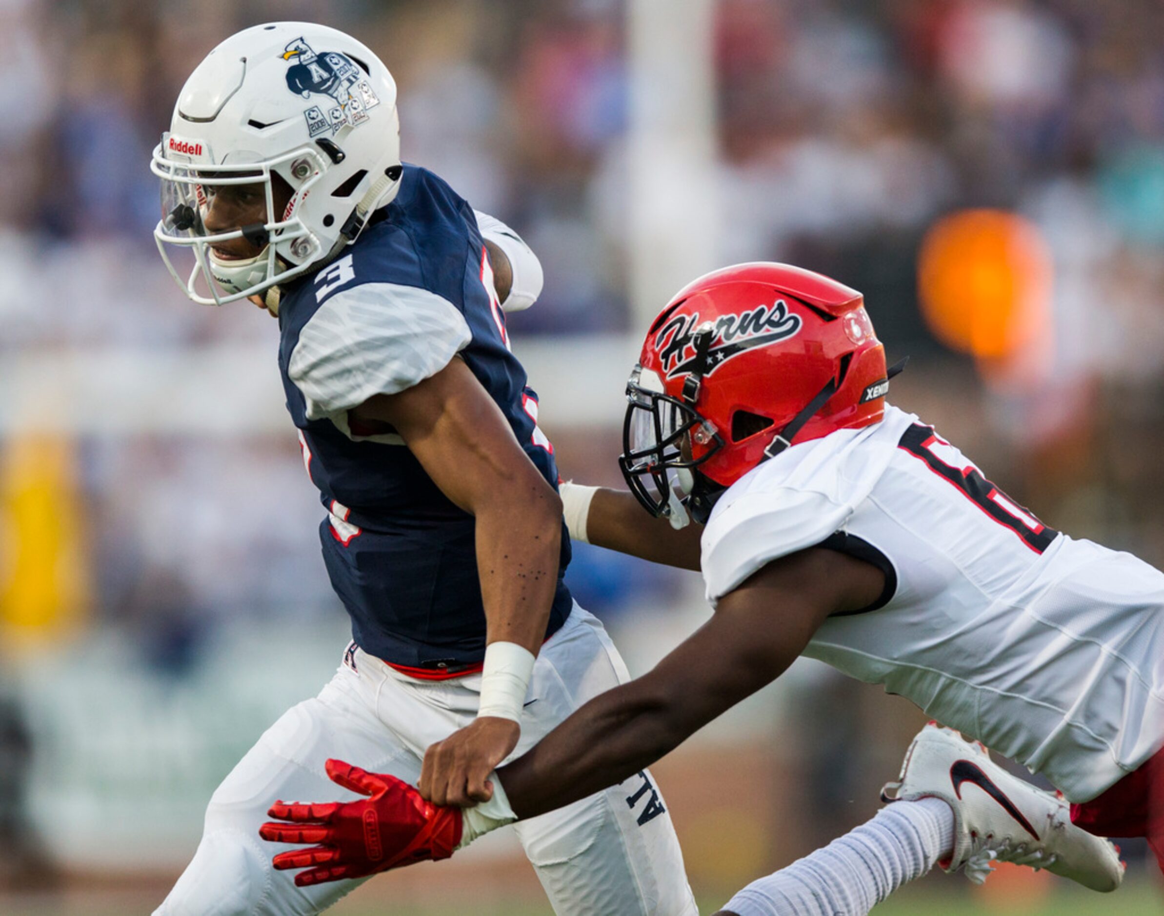 Allen quarterback Raylen Sharpe (3) runs the ball to the end zone for a touchdown ahead of...