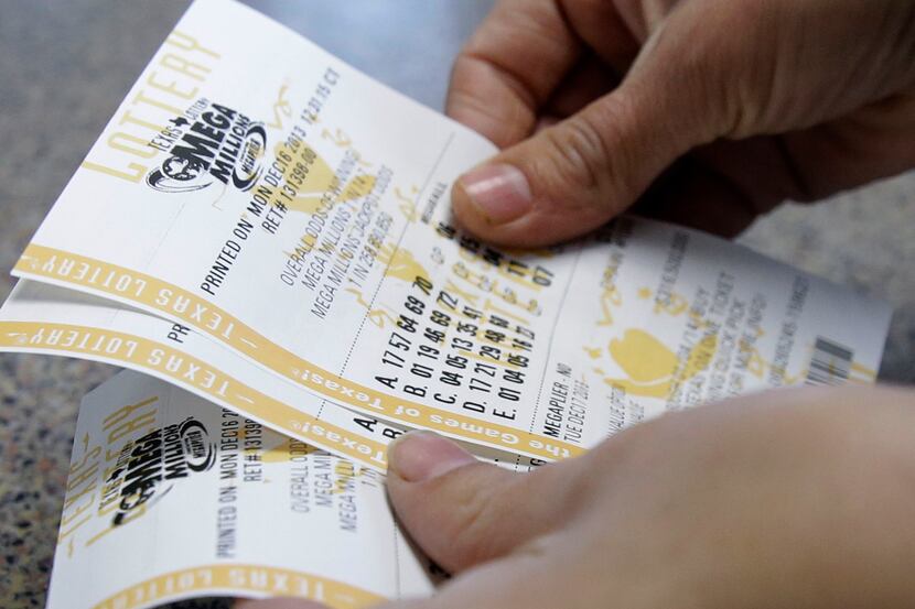 Mega Millions lottery tickets are sold at the Fuel City convenience story Monday, Dec. 16,...