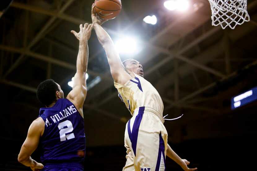 Dec 8, 2015; Seattle, WA, USA; Washington Huskies guard Andrew Andrews (12) is fouled on a...