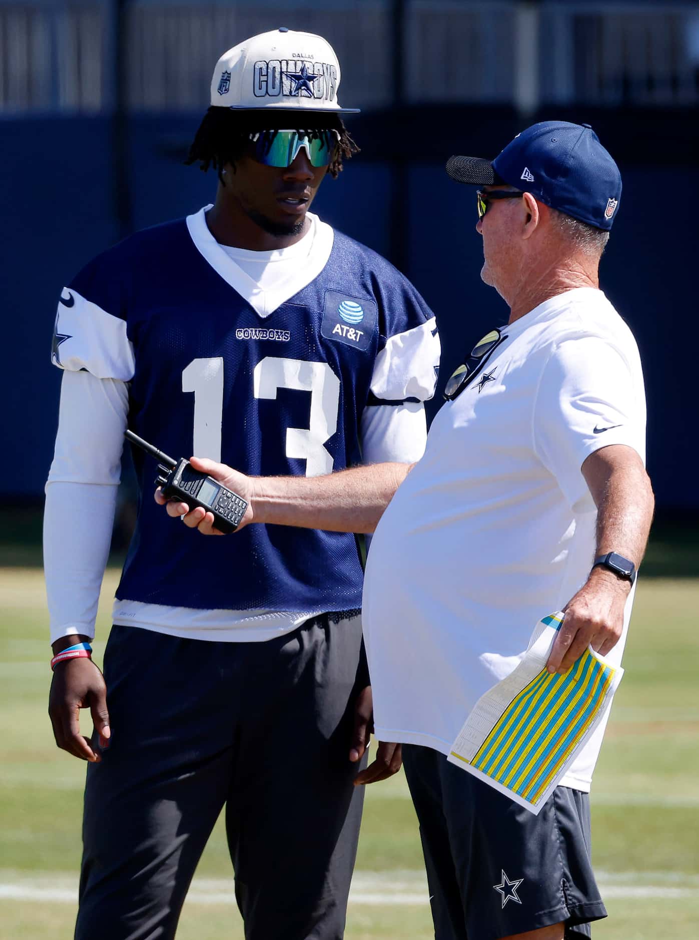 Dallas Cowboys defensive coordinator Mike Zimmer gives instruction to linebacker DeMarvion...