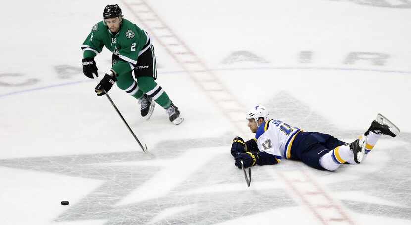 St. Louis Blues left wing Jaden Schwartz (17) dives to clear the puck away from Dallas Stars...