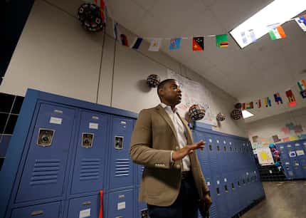 Forest Lane Academy Principal DeMarcus Goree-Watkins talks with The Dallas Morning News at...