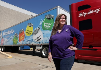 Merrilee Kick poses for a photograph at BuzzBallz in Carrollton.