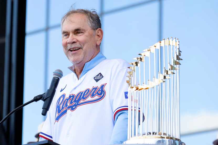 Texas Rangers manager Bruce Bochy speaks to fans during the World Series Victory Parade and...